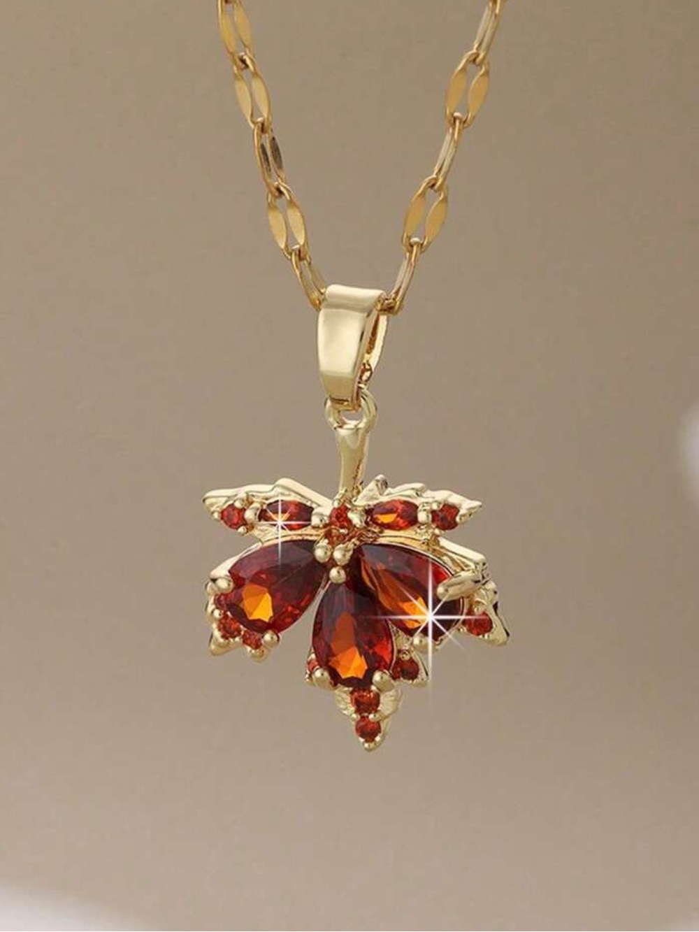 Gold Leaf Necklace with Garnet-Red Crystal Accents